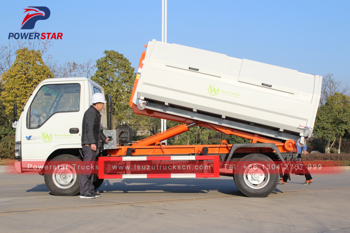 Saint Martin 1 Isuzu hooklift garbage truck with 4 garbage bin