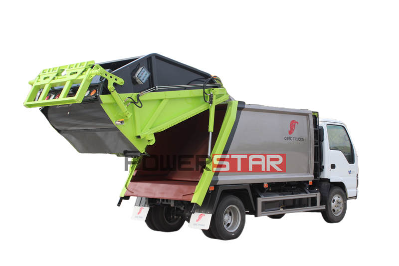 Isuzu 600P garbage compactor truck