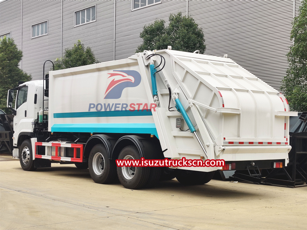 Isuzu compactor trash truck