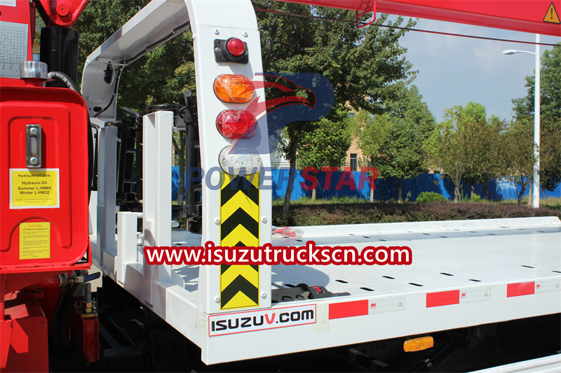 Isuzu wrecker truck with crane