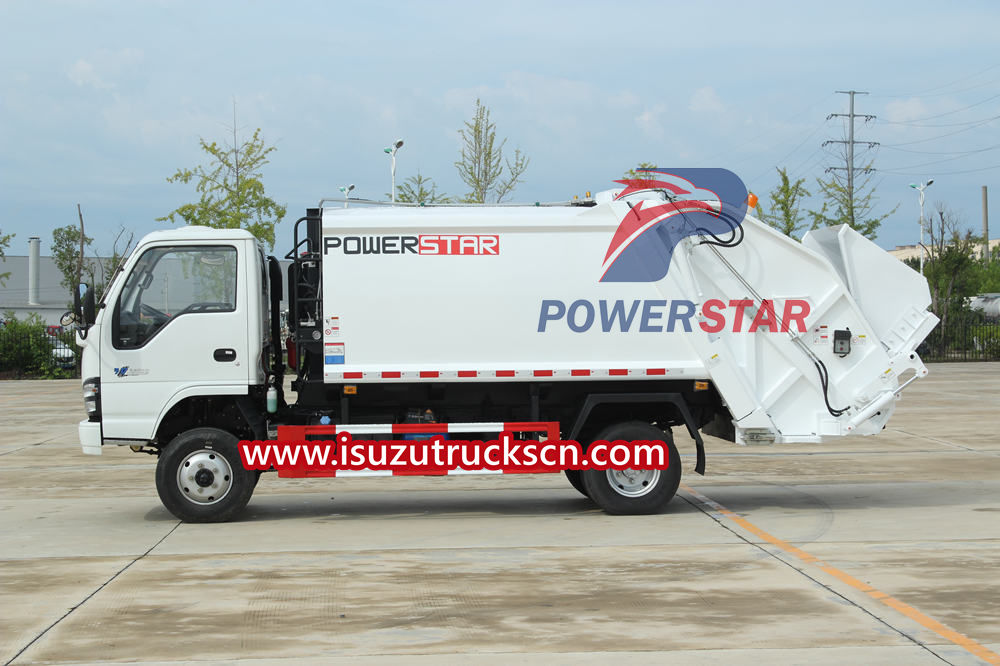 Isuzu compactor trash truck