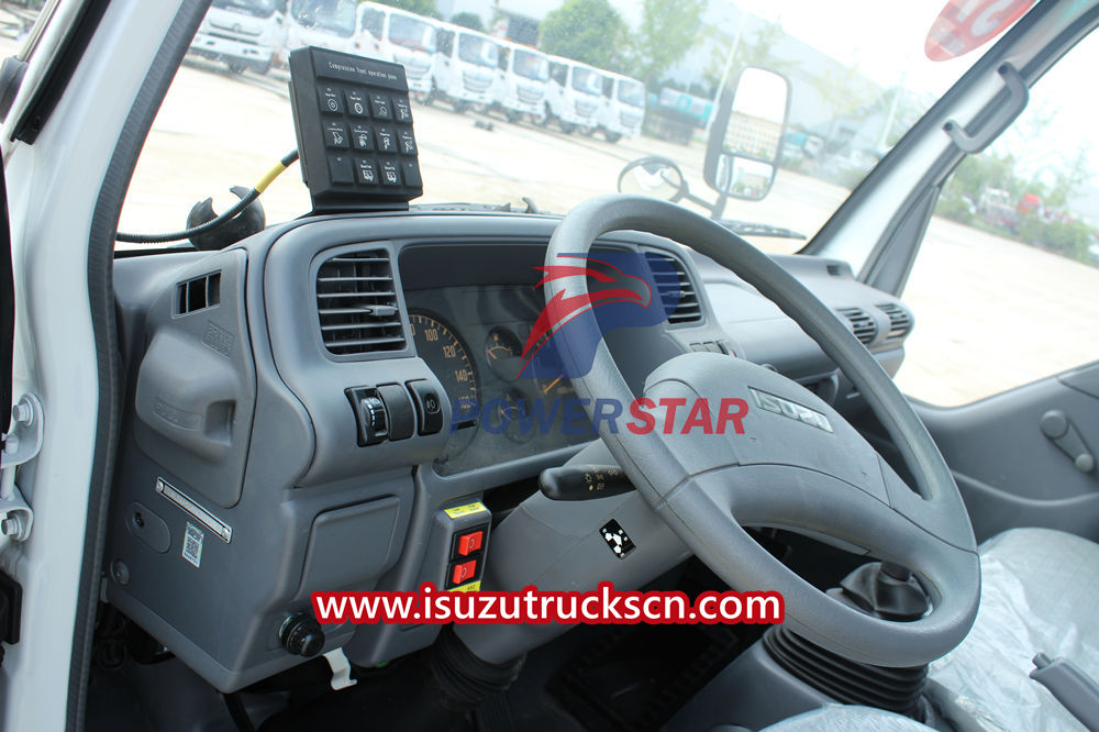 Isuzu refuse compactor truck