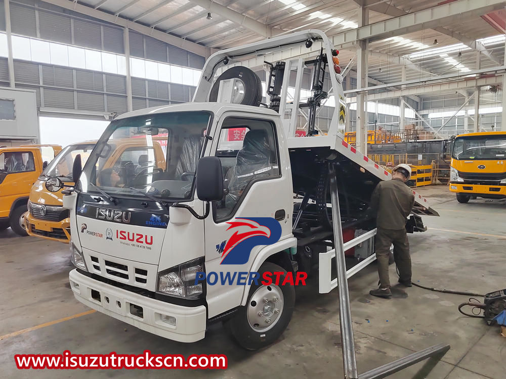 Isuzu flatbed wrecker carrier