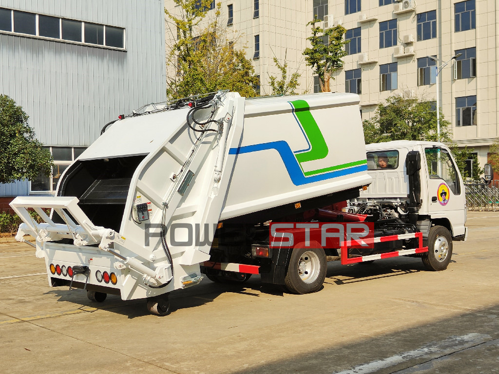 Isuzu hook loader truck with compactor body