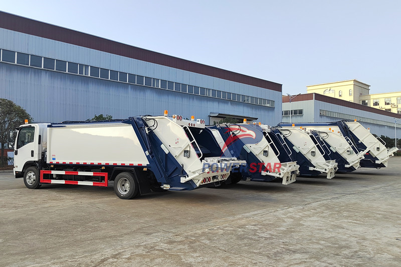 Isuzu trash compactor truck