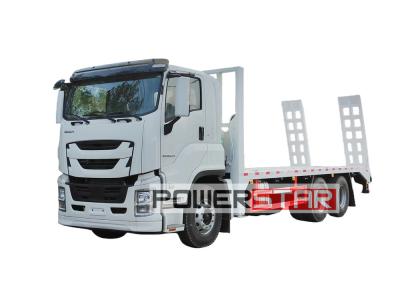 Isuzu Giga 10 wheeler hauling flatbed truck